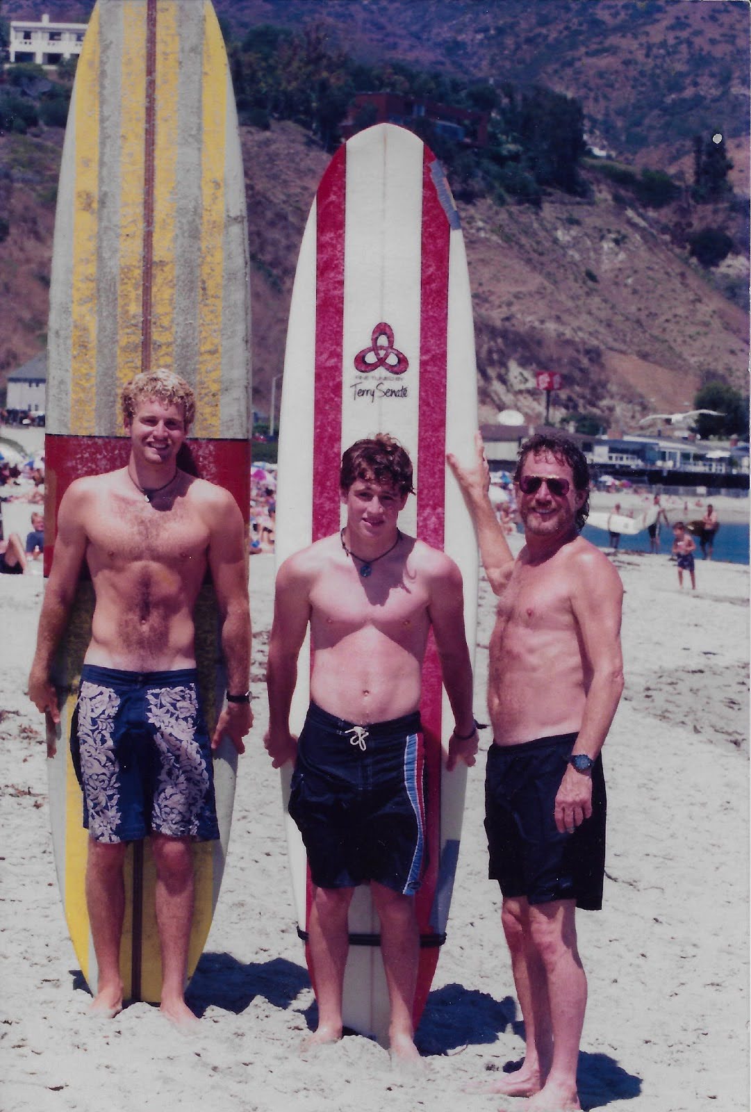 Alfred Kim Guggenheim at Malibu Surfrider beach with his boys